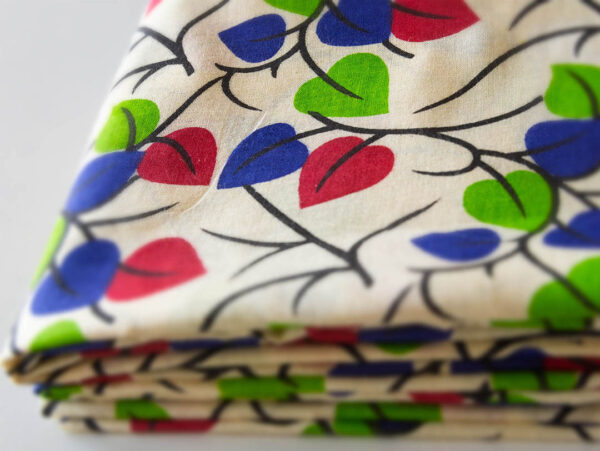Fabric Blue Red Green Leafy 3 https://chaturango.com/cotton-fabric-online-leaf-pattern-blue-red-green/