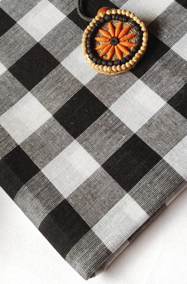 Fabric Handloom Checks Black White 3 https://chaturango.com/handloom-fabrics-cotton-checks-black-white/