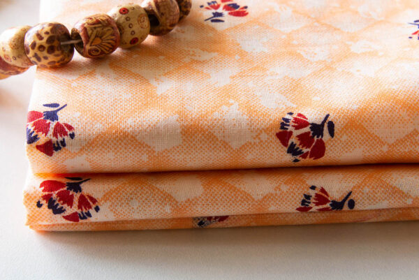 Fabric Orange Floral 3 https://chaturango.com/floral-print-cotton-fabric-online-orange/